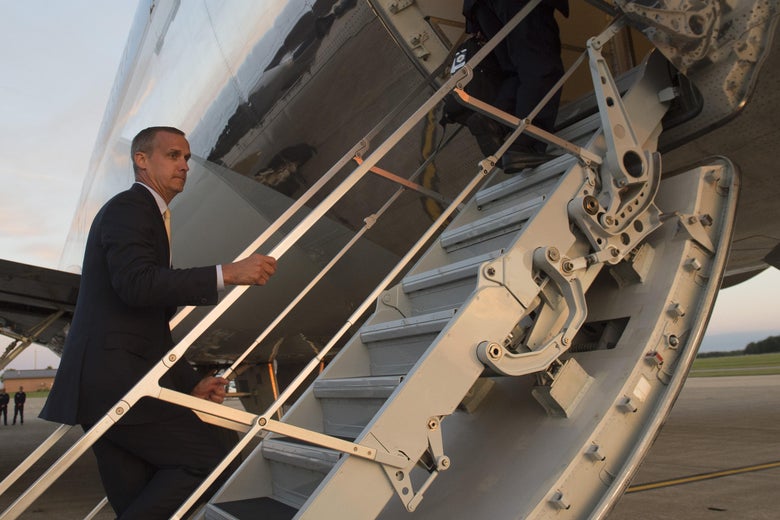 Former campaign aide Corey Lewandowski boards Air Force One prior to departure from Youngstown-Warren Regional Airport in Vienna, Ohio, July 25, 2017, following a campaign rally with US President Donald Trump. / AFP PHOTO / SAUL LOEB (Photo credit should read SAUL LOEB/AFP/Getty Images)
